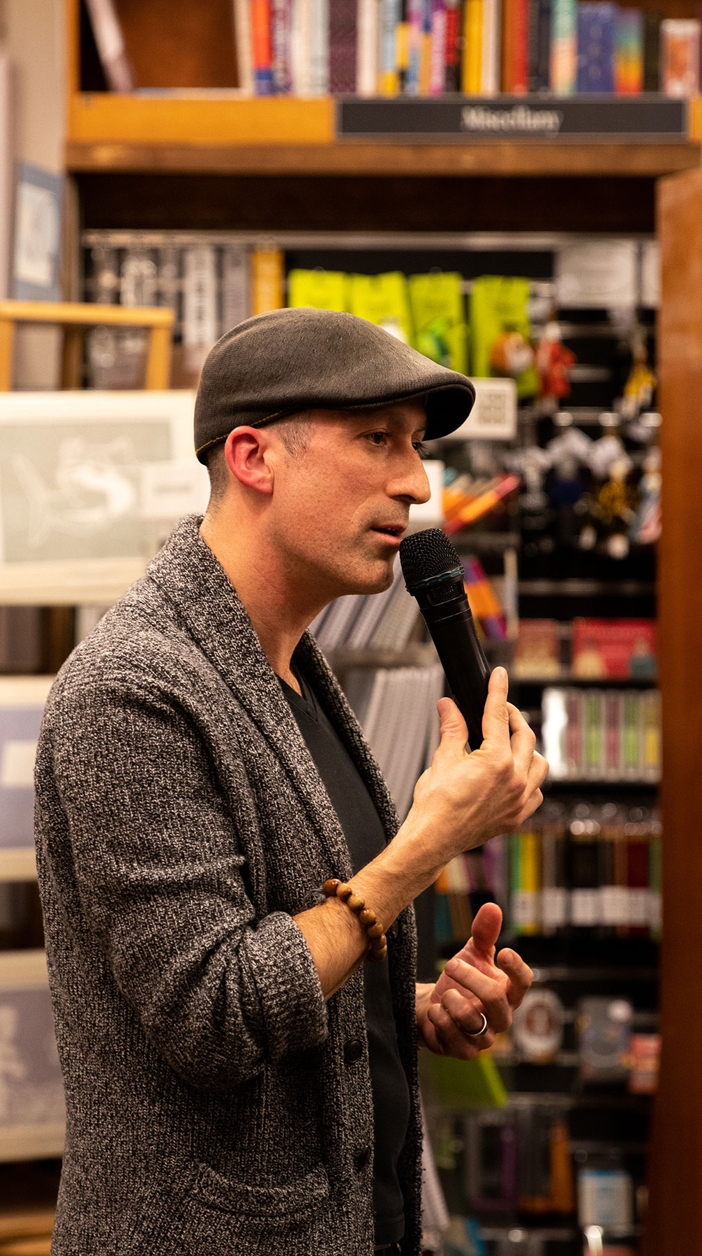 David Delmar Senties speaking at Harvard Bookstore